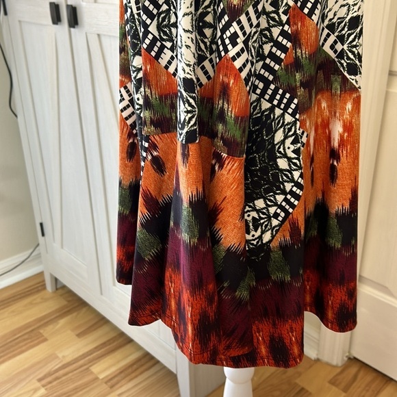 Melissa Paige NWT Black/Orange Long Blouse with front key hole Size 1x - Picture 4 of 11